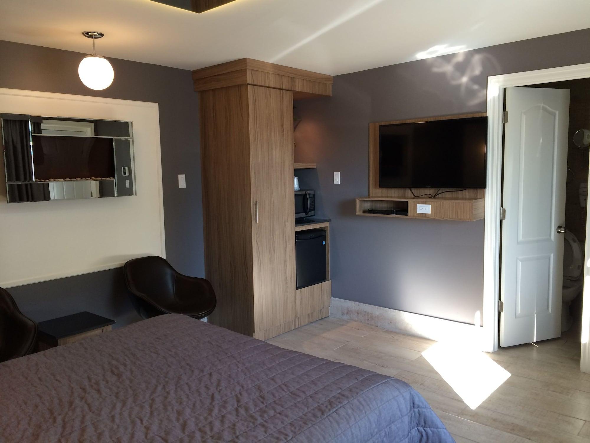 Olux Hotel-Motel-Suites Лаваль Экстерьер фото